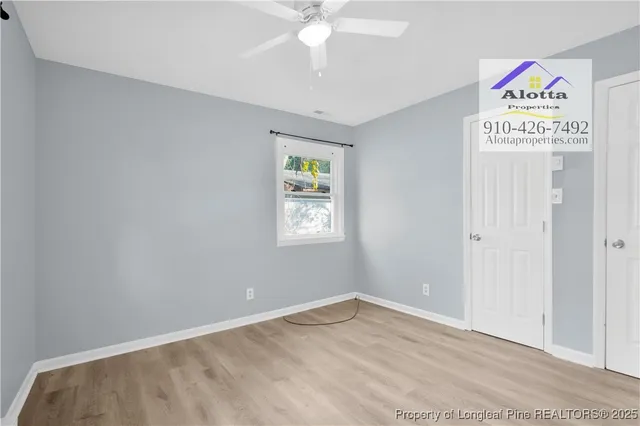 a view of an entryway with kitchen