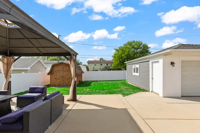 a backyard of a house with lots of green space
