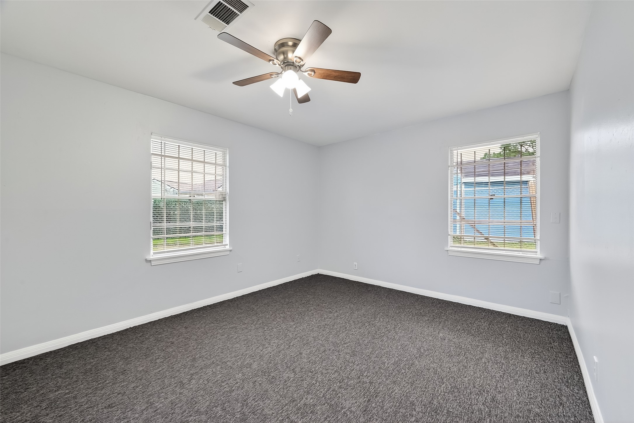 6112 Pineway Boulevard Houston, TX 77023 - Photo 16 of 21 a view of an empty room with a window