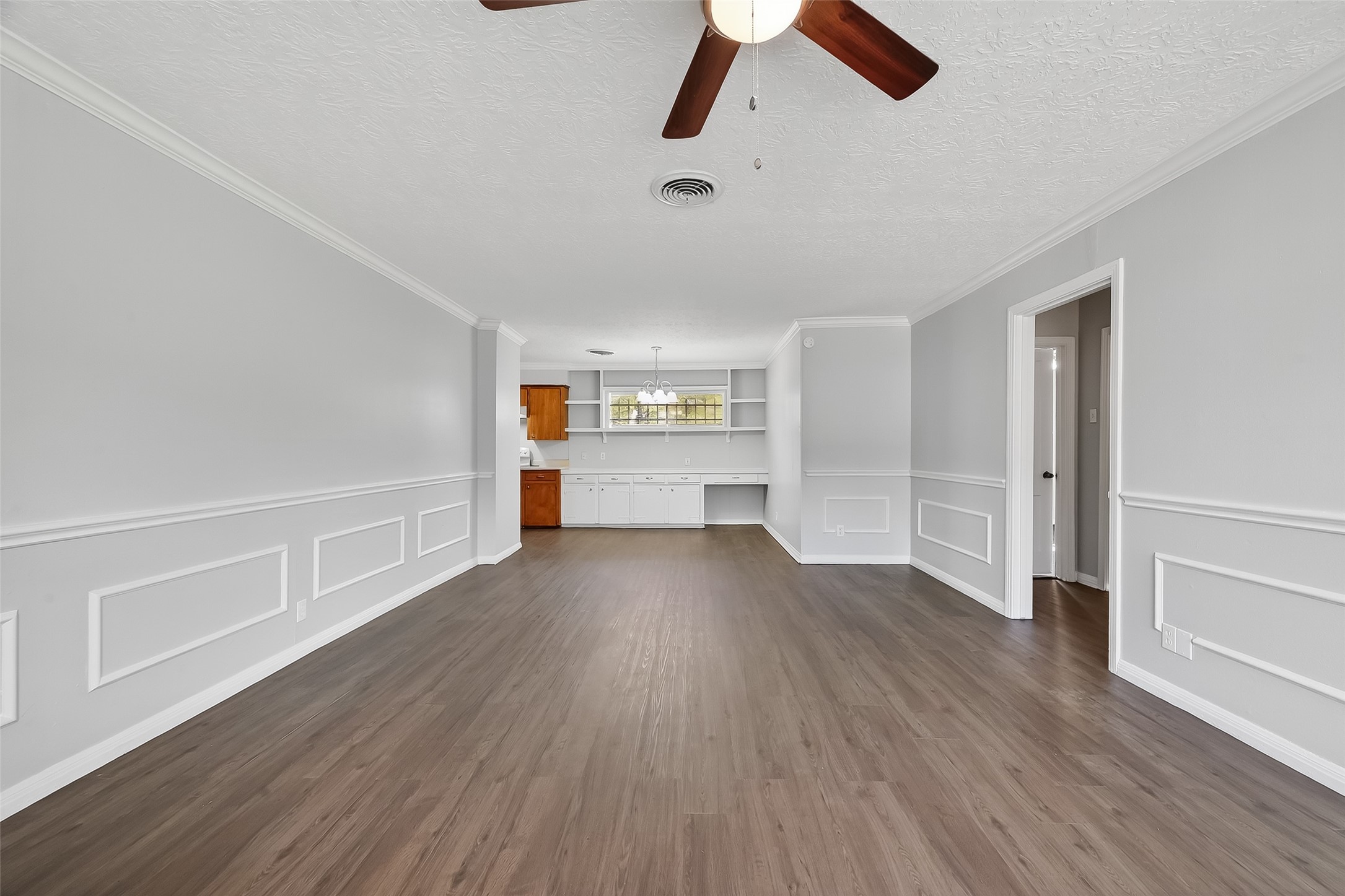 6112 Pineway Boulevard Houston, TX 77023 - Photo 7 of 21 wooden floor in an empty room with a window