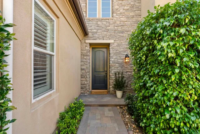 a front view of a house with a porch