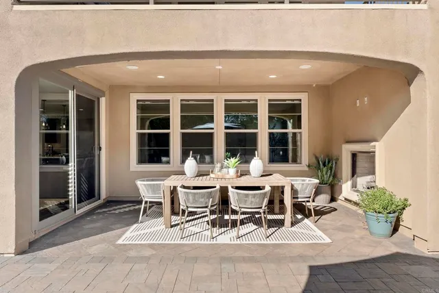 an aerial view of residential houses and outdoor space