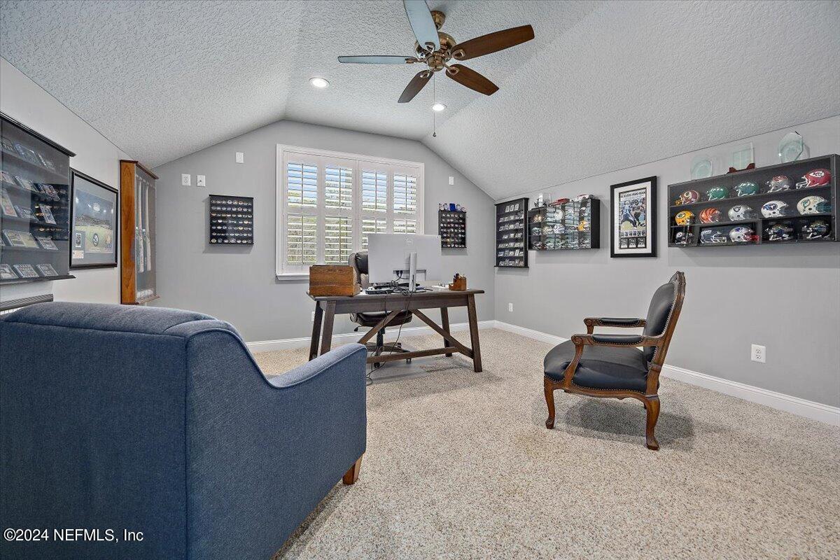 11322 Mandarin Ridge Lane Jacksonville, FL 32258 - Photo 11 of 37 a living room with furniture and a window