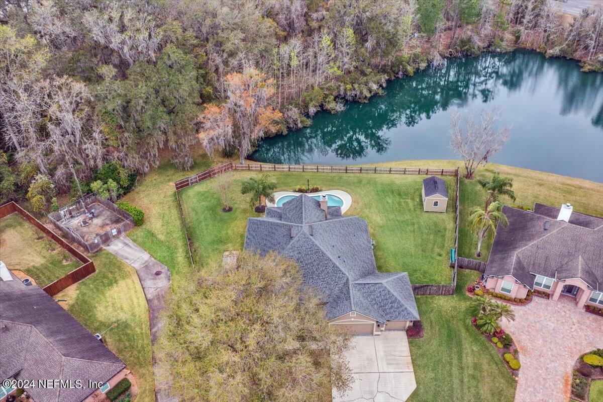 11322 Mandarin Ridge Lane Jacksonville, FL 32258 - Photo 15 of 37 an aerial view of a house with a lake view