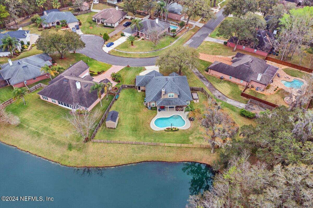 11322 Mandarin Ridge Lane Jacksonville, FL 32258 - Photo 17 of 37 an aerial view of residential house with outdoor space and swimming pool
