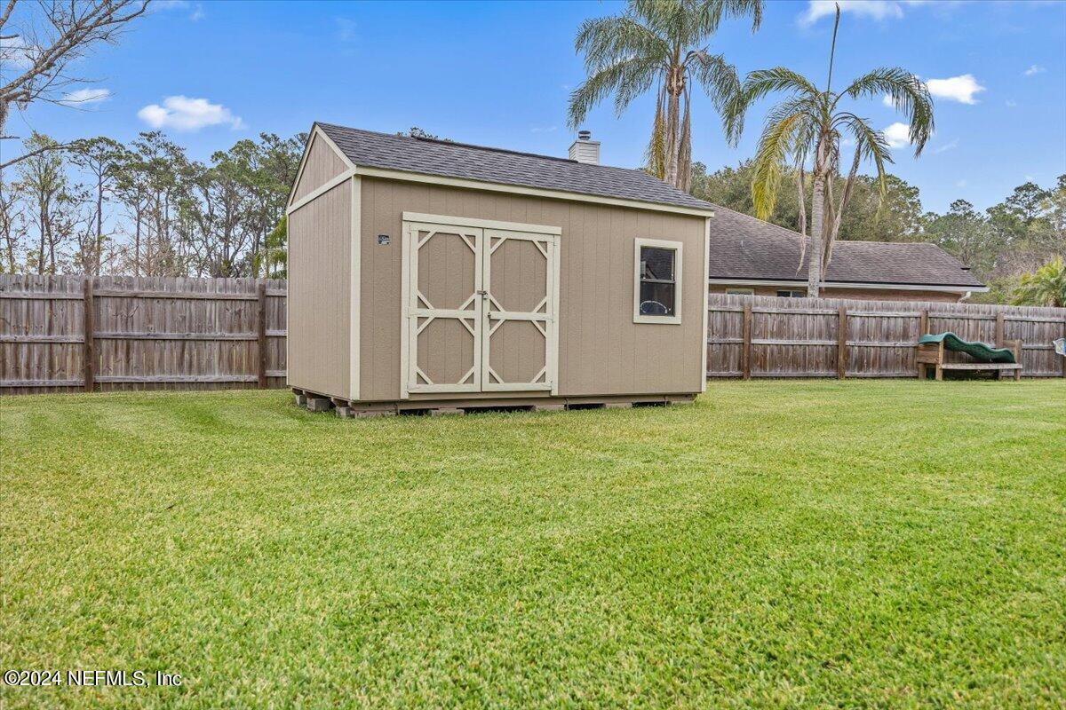 11322 Mandarin Ridge Lane Jacksonville, FL 32258 - Photo 30 of 37 a view of a house with a yard