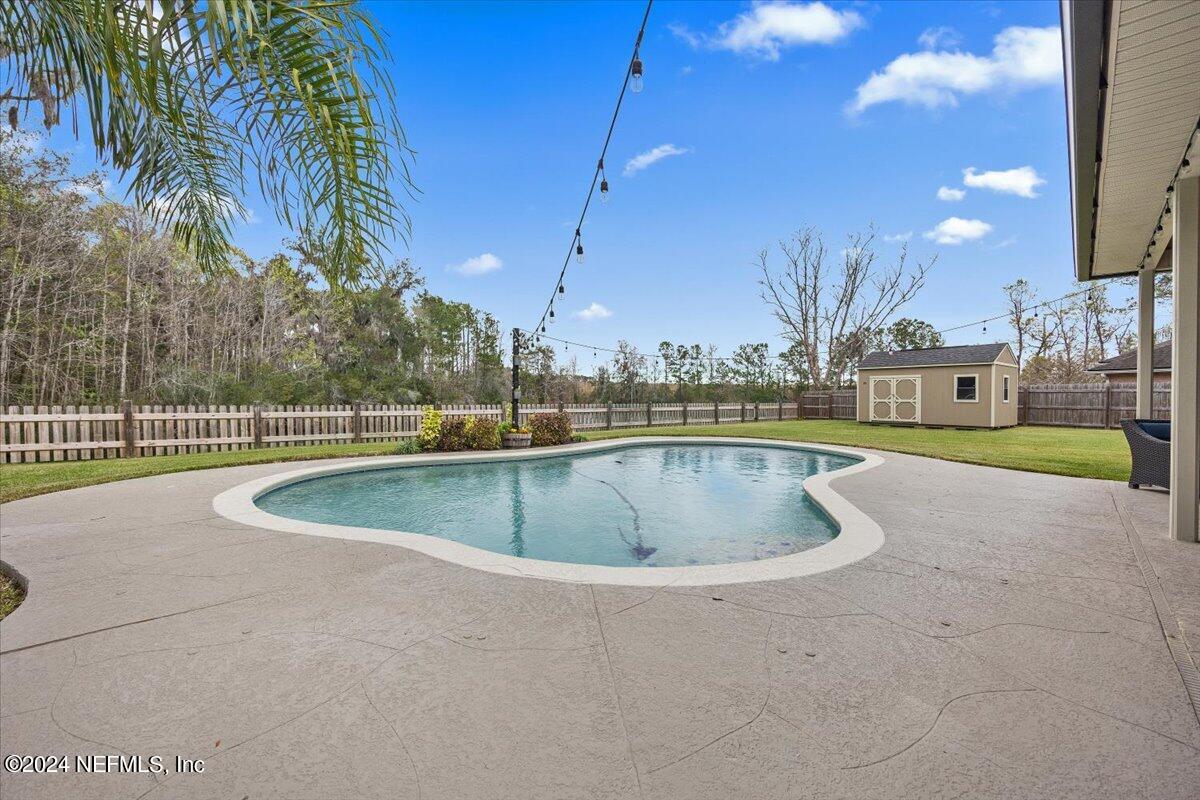 11322 Mandarin Ridge Lane Jacksonville, FL 32258 - Photo 33 of 37 a view of outdoor space and swimming pool