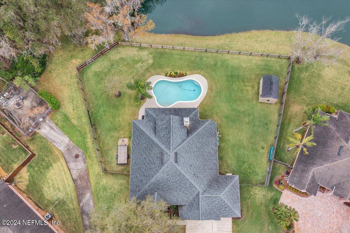 11322 Mandarin Ridge Lane Jacksonville, FL 32258 - Photo 34 of 37 an aerial view of a house with a yard