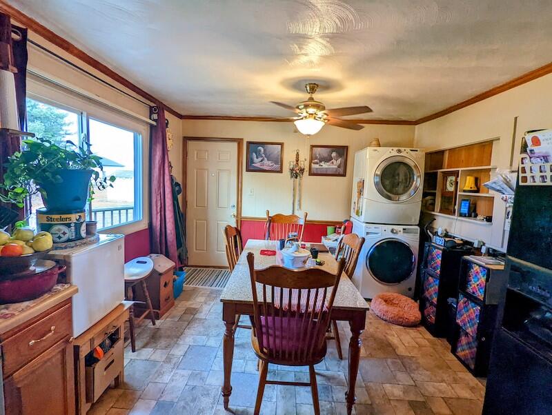 6785 Conner Road Northeast Copper Hill, VA 24079 - Photo 8 of 27 a view of a dining room with furniture window and wooden floor