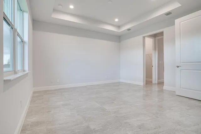 a bathroom with a double vanity sink mirror and double