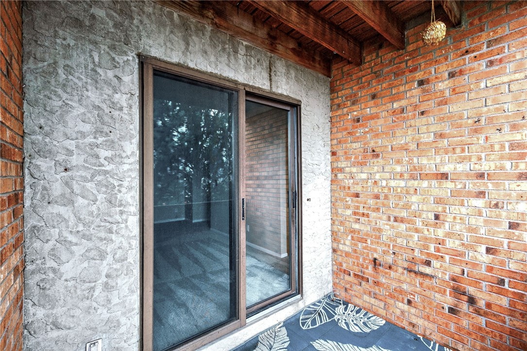 3151 Roesch Boulevard, Unit 6 Fairfield, OH 45014 - Photo 25 of 29 This inviting patio features durable brick and textured stucco walls, perfect for outdoor relaxation.