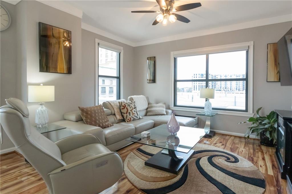 a living room with furniture and window