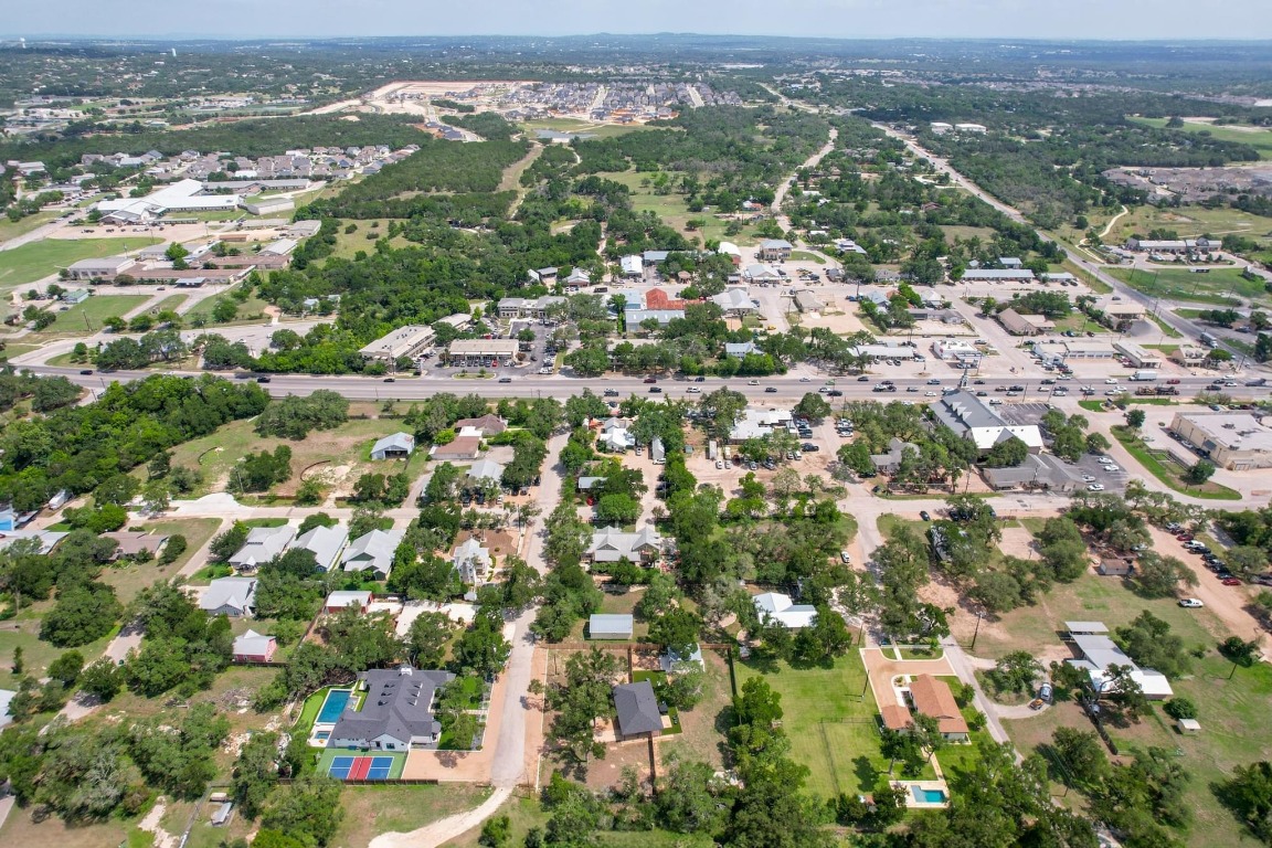 219 Bluff Street Dripping Springs, TX 78620 - Photo 39 of 40 an aerial view of residential houses with outdoor space