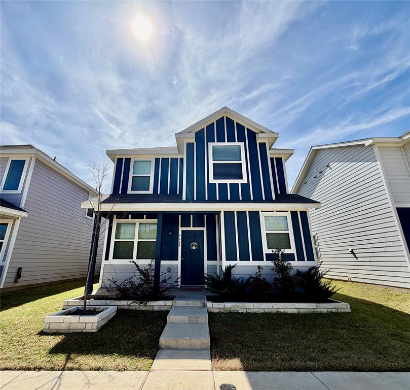 5664 Shore Point Trail Fort Worth, TX 76119 - Photo 1 of 29 a front view of residential houses with yard