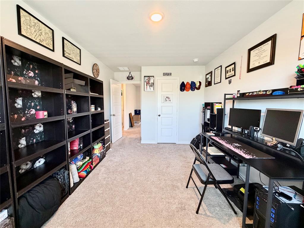 5664 Shore Point Trail Fort Worth, TX 76119 - Photo 20 of 29 a view of a workspace with furniture