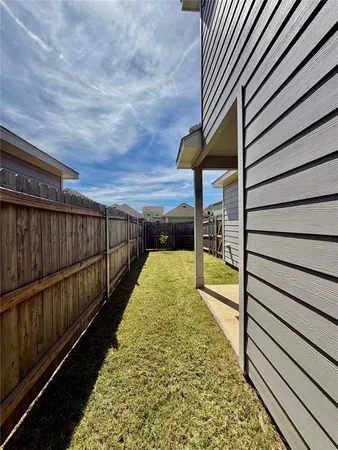 a view of balcony with wooden floor