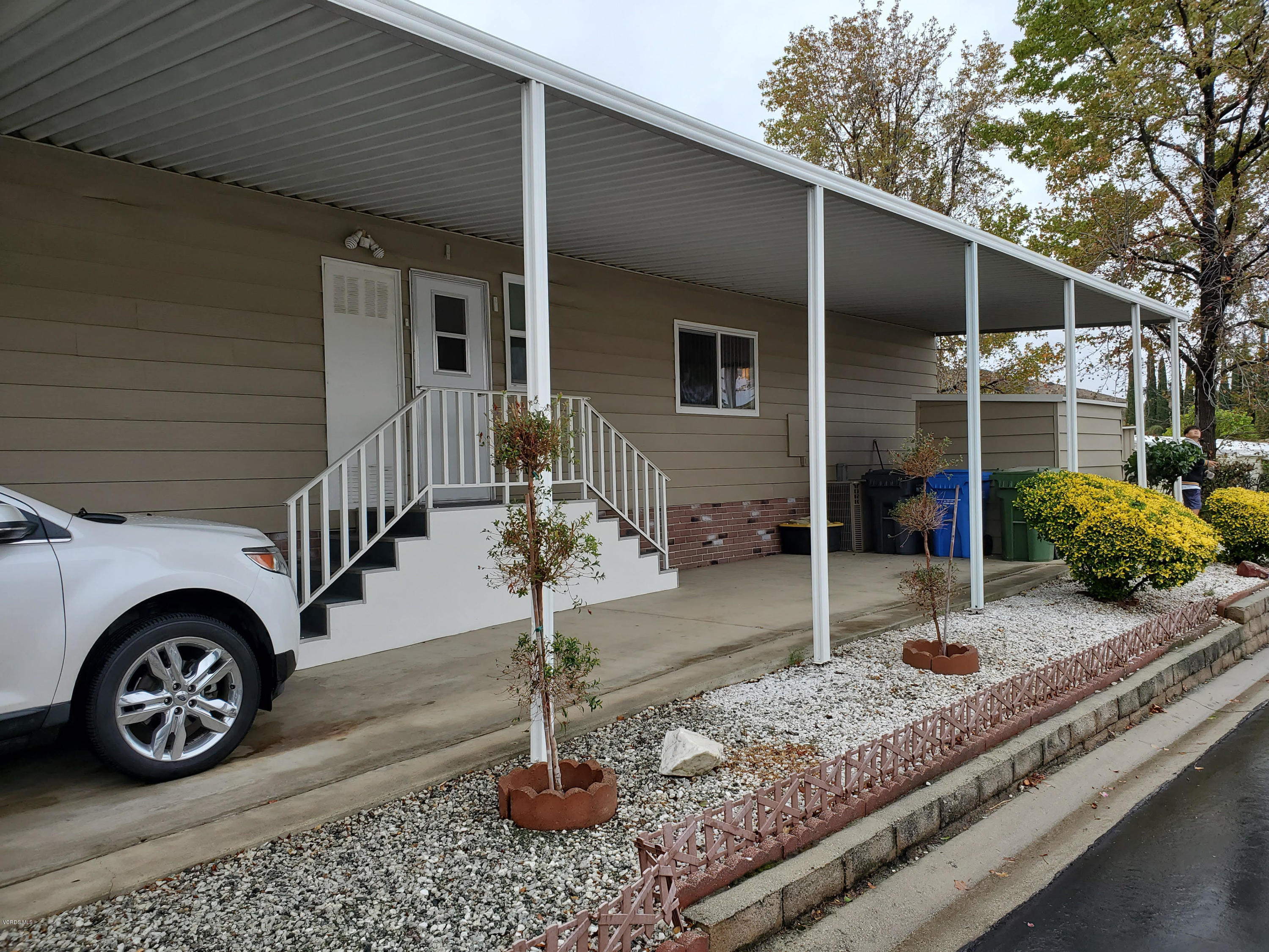 6480 Katherine Road, Unit 132 Simi Valley, CA 93063 - Photo 4 of 38 a view of a house with a patio