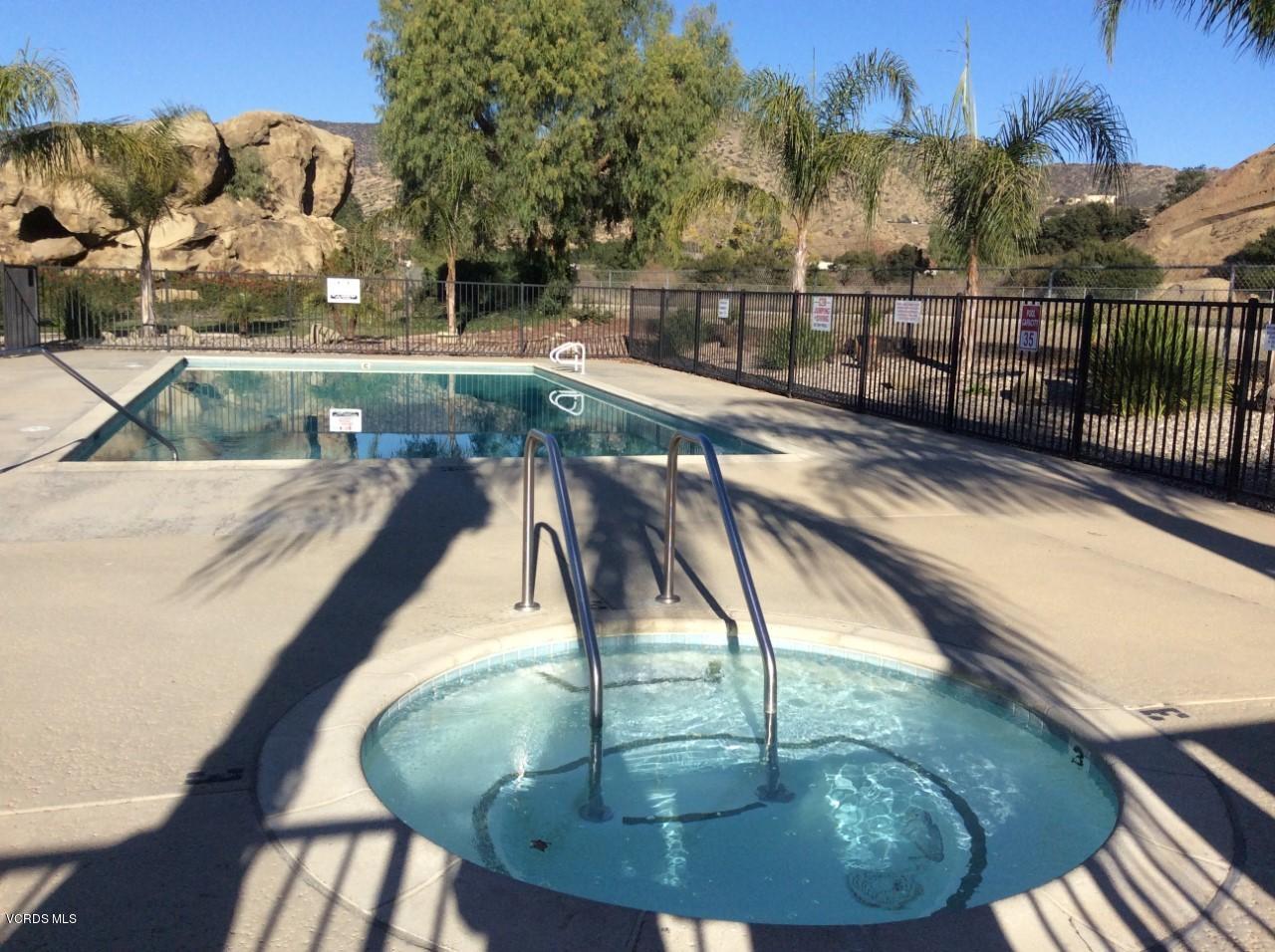 6480 Katherine Road, Unit 132 Simi Valley, CA 93063 - Photo 36 of 38 a view of a swimming pool