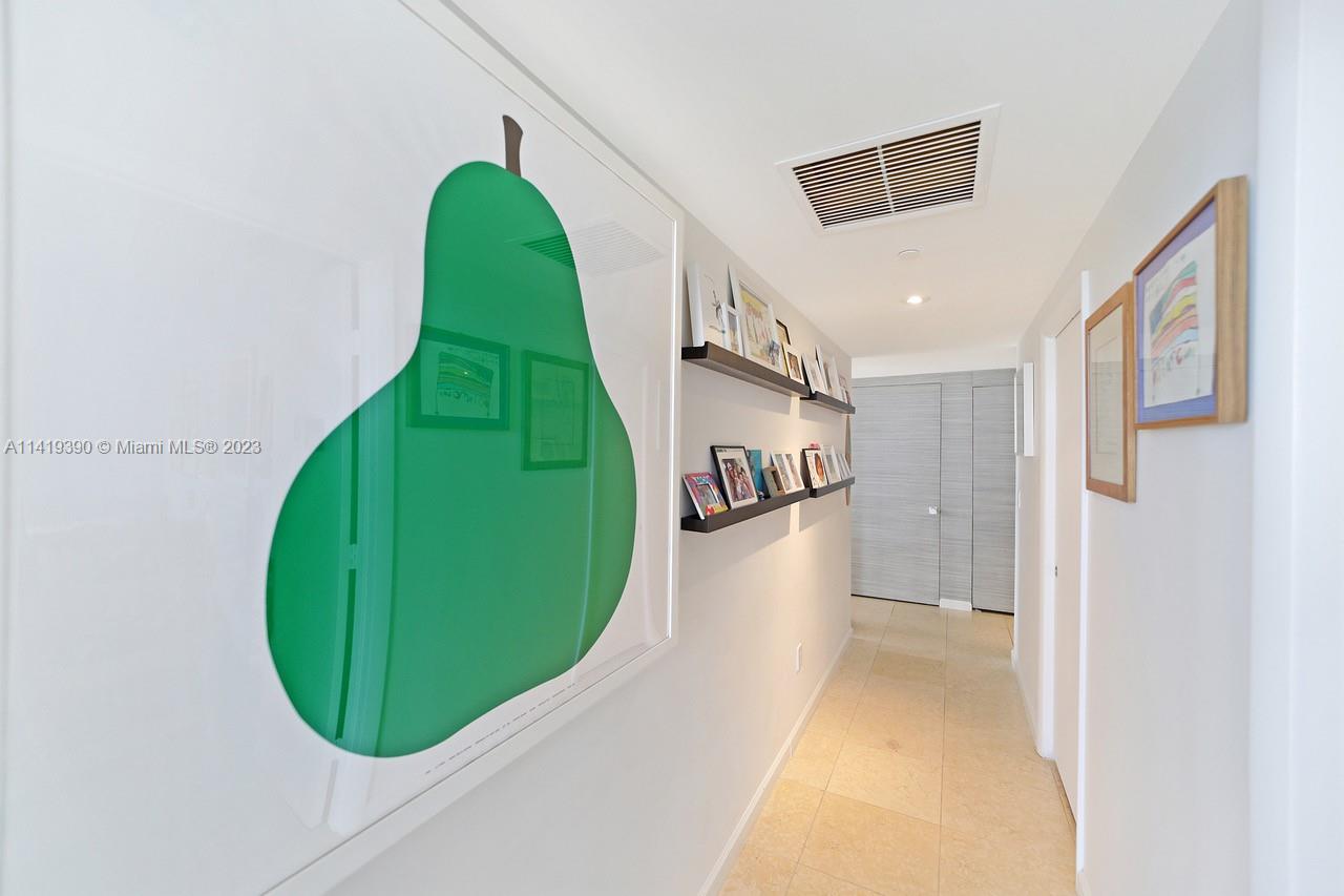 465 Brickell Avenue, Unit 2001 Miami, FL 33131 - Photo 37 of 62 a view of a floor to ceiling window and a garage