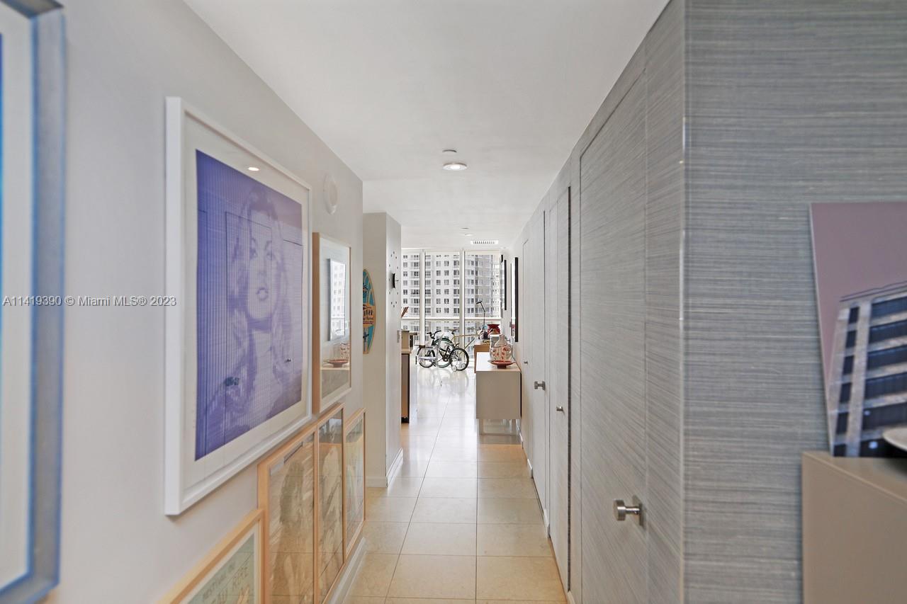 465 Brickell Avenue, Unit 2001 Miami, FL 33131 - Photo 45 of 62 a view of a hallway with interior of the house