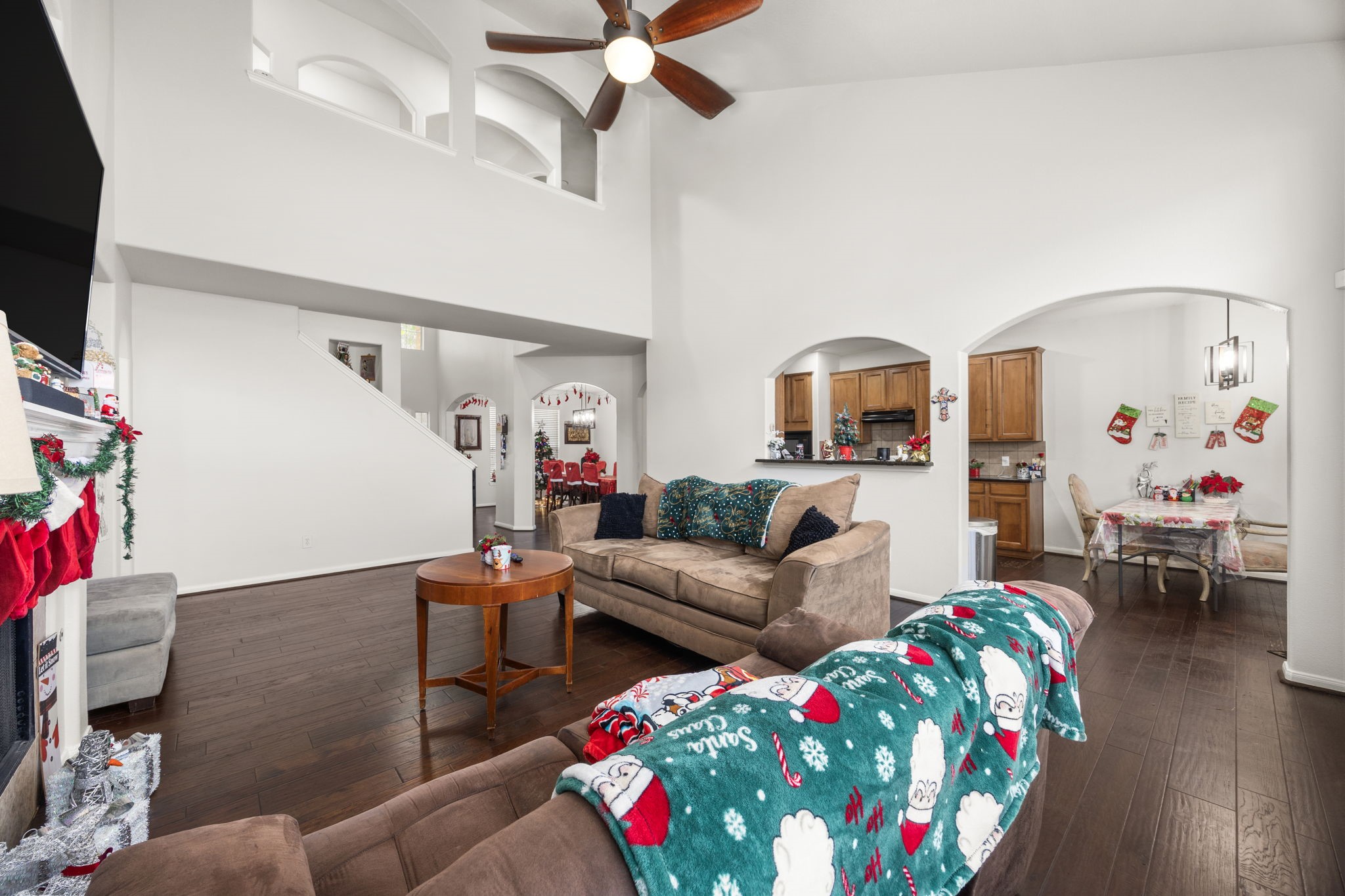 927 Spring Source Place Spring, TX 77373 - Photo 12 of 37 a living room with furniture and a flat screen tv