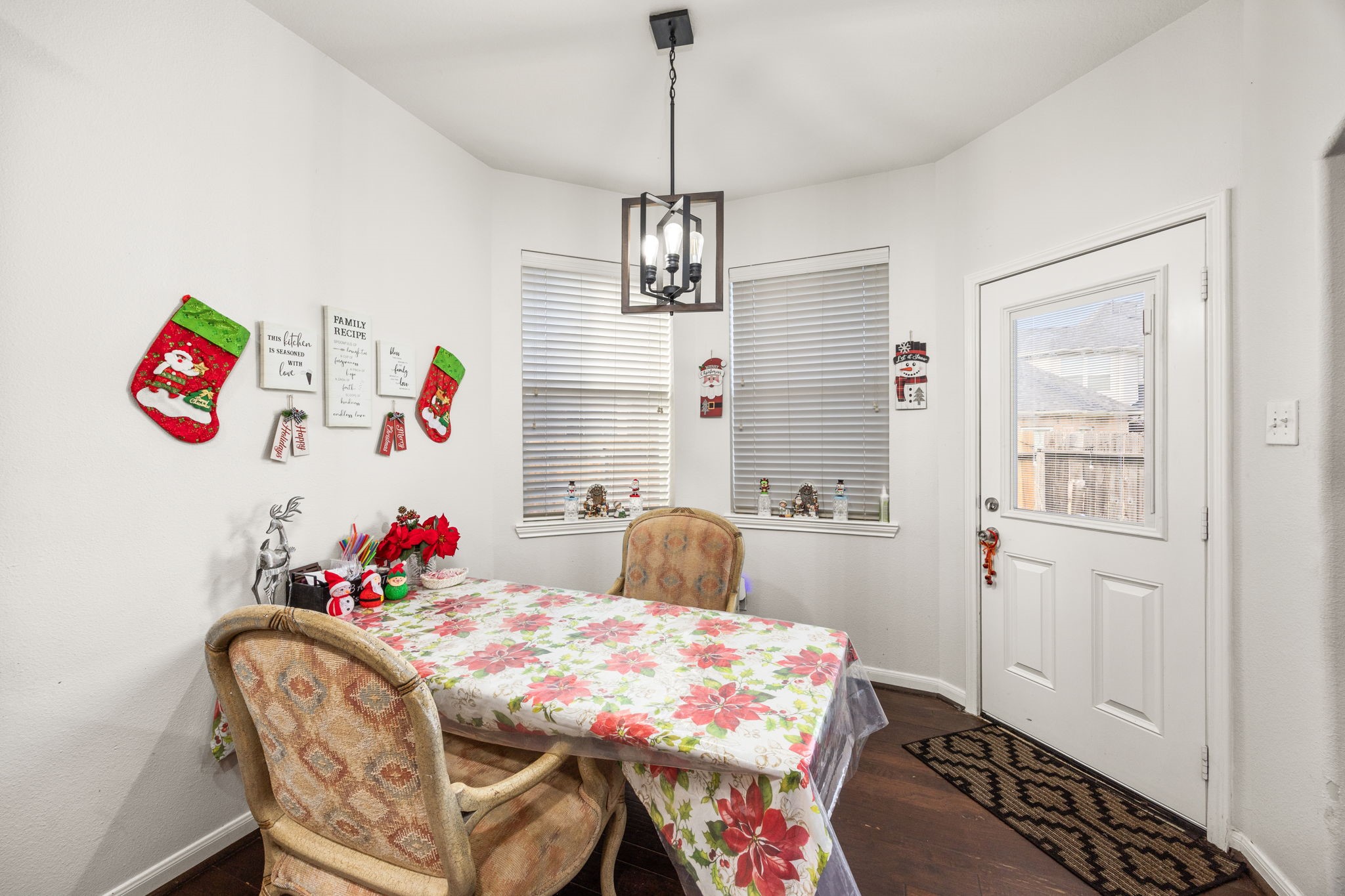 927 Spring Source Place Spring, TX 77373 - Photo 13 of 37 a bedroom with a bed and a chandelier