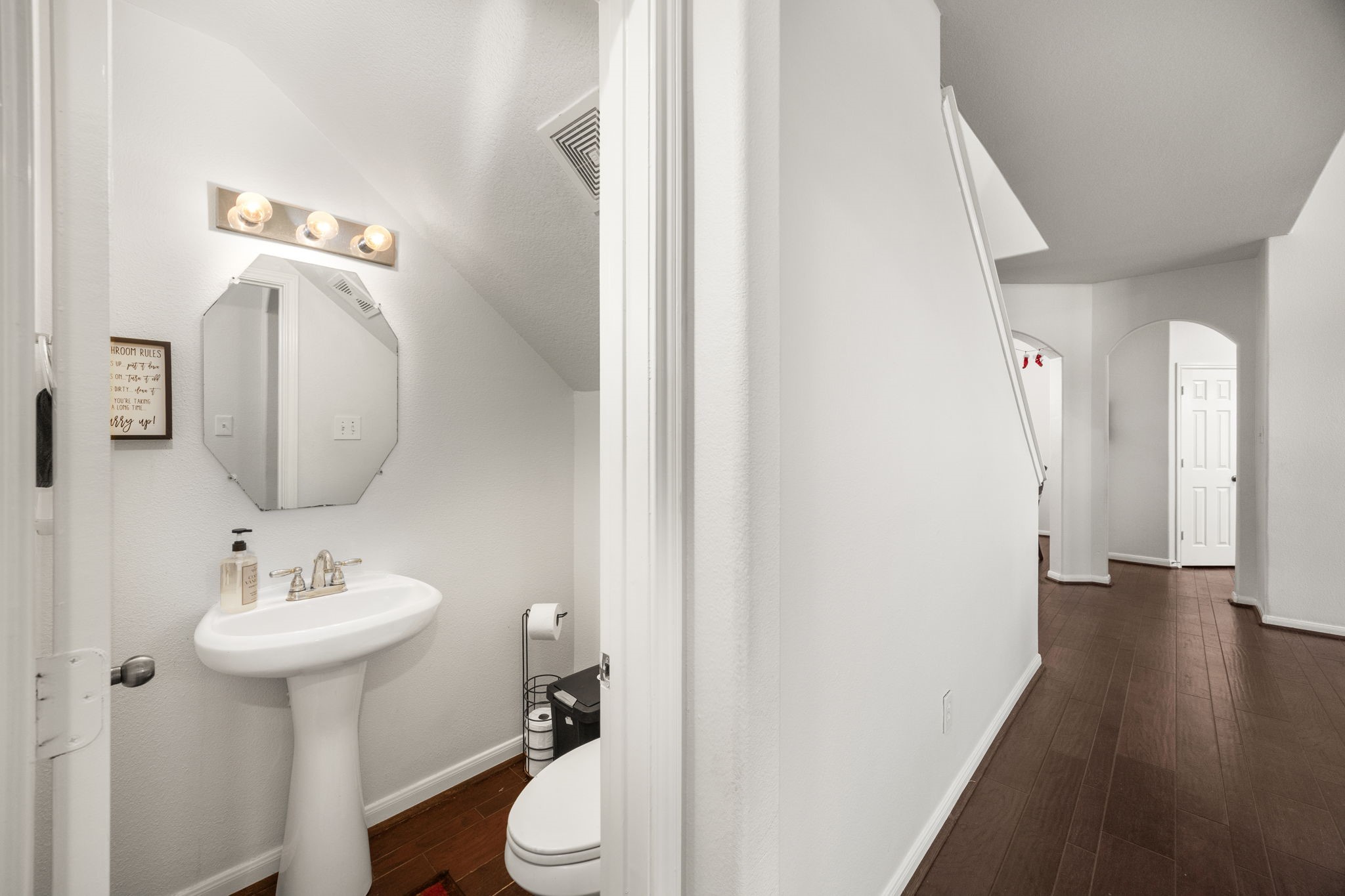 927 Spring Source Place Spring, TX 77373 - Photo 17 of 37 a bathroom with a toilet sink and mirror