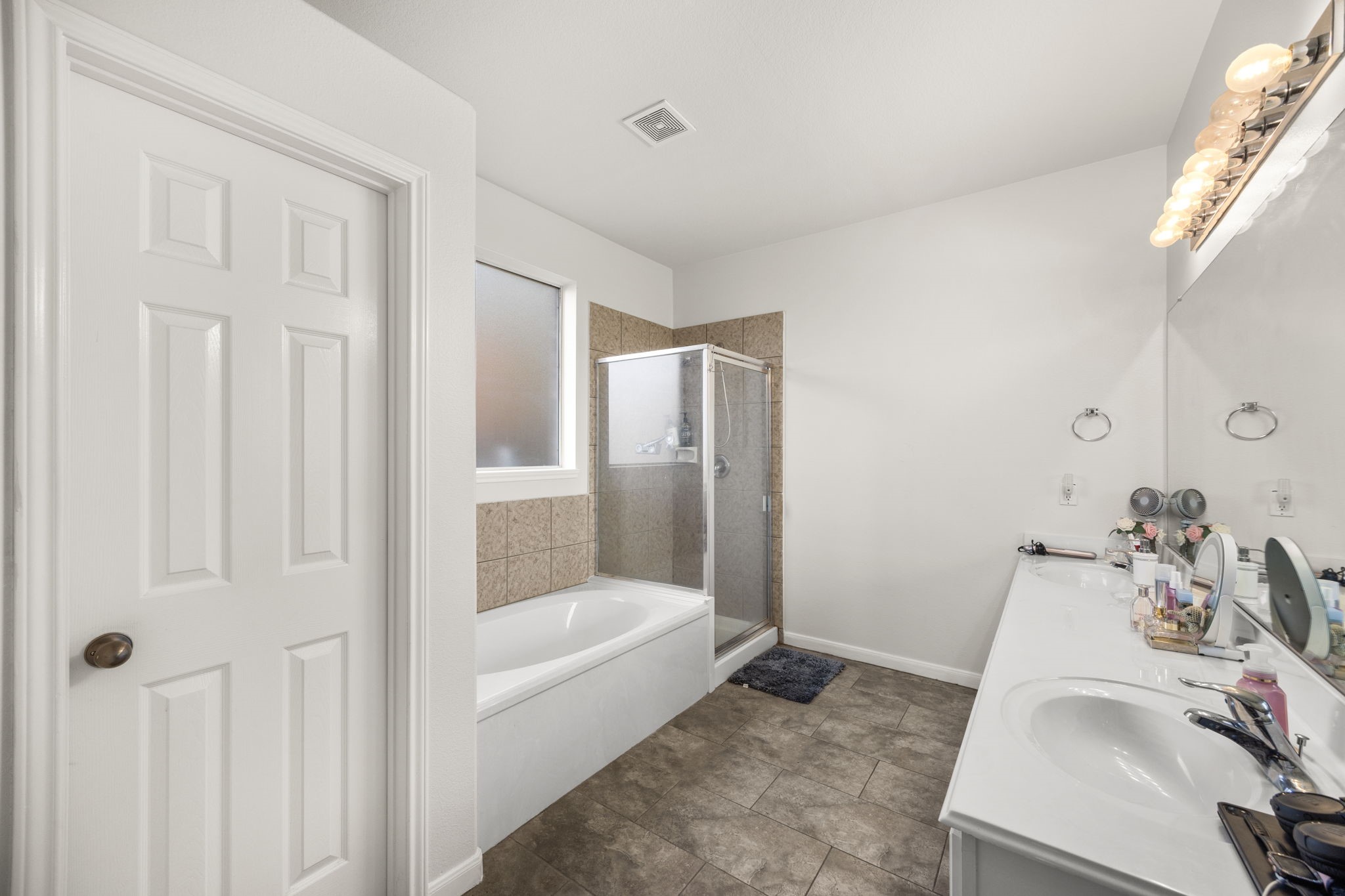 927 Spring Source Place Spring, TX 77373 - Photo 20 of 37 a bathroom with a tub and sink