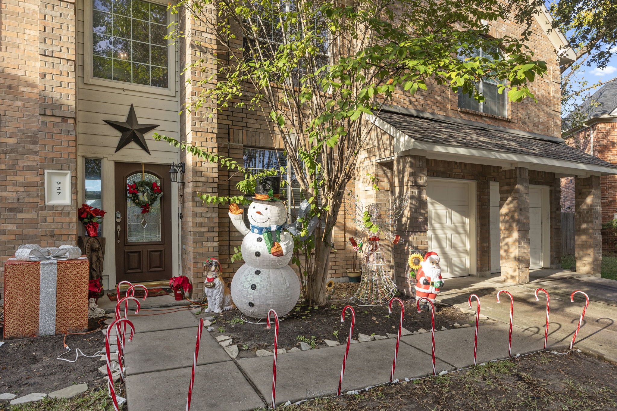 927 Spring Source Place Spring, TX 77373 - Photo 2 of 37 a backyard of a house with outdoor seating