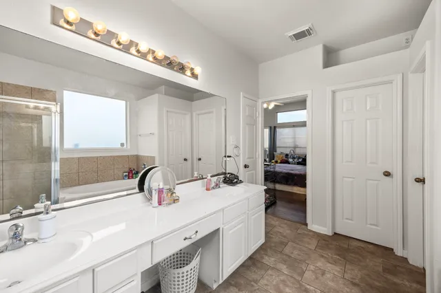 a bathroom with a sink double vanity