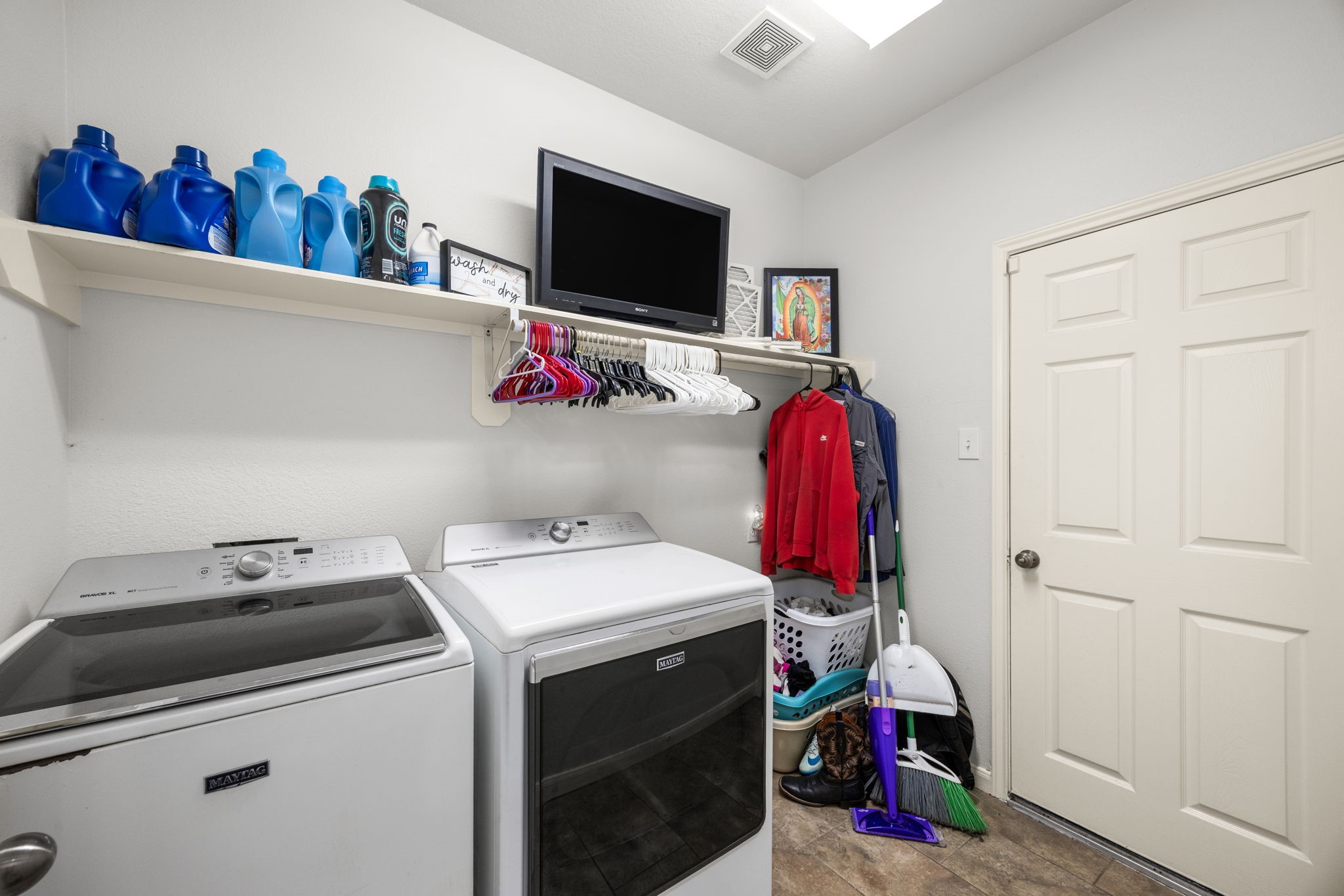 927 Spring Source Place Spring, TX 77373 - Photo 30 of 37 a utility room with dryer and washer
