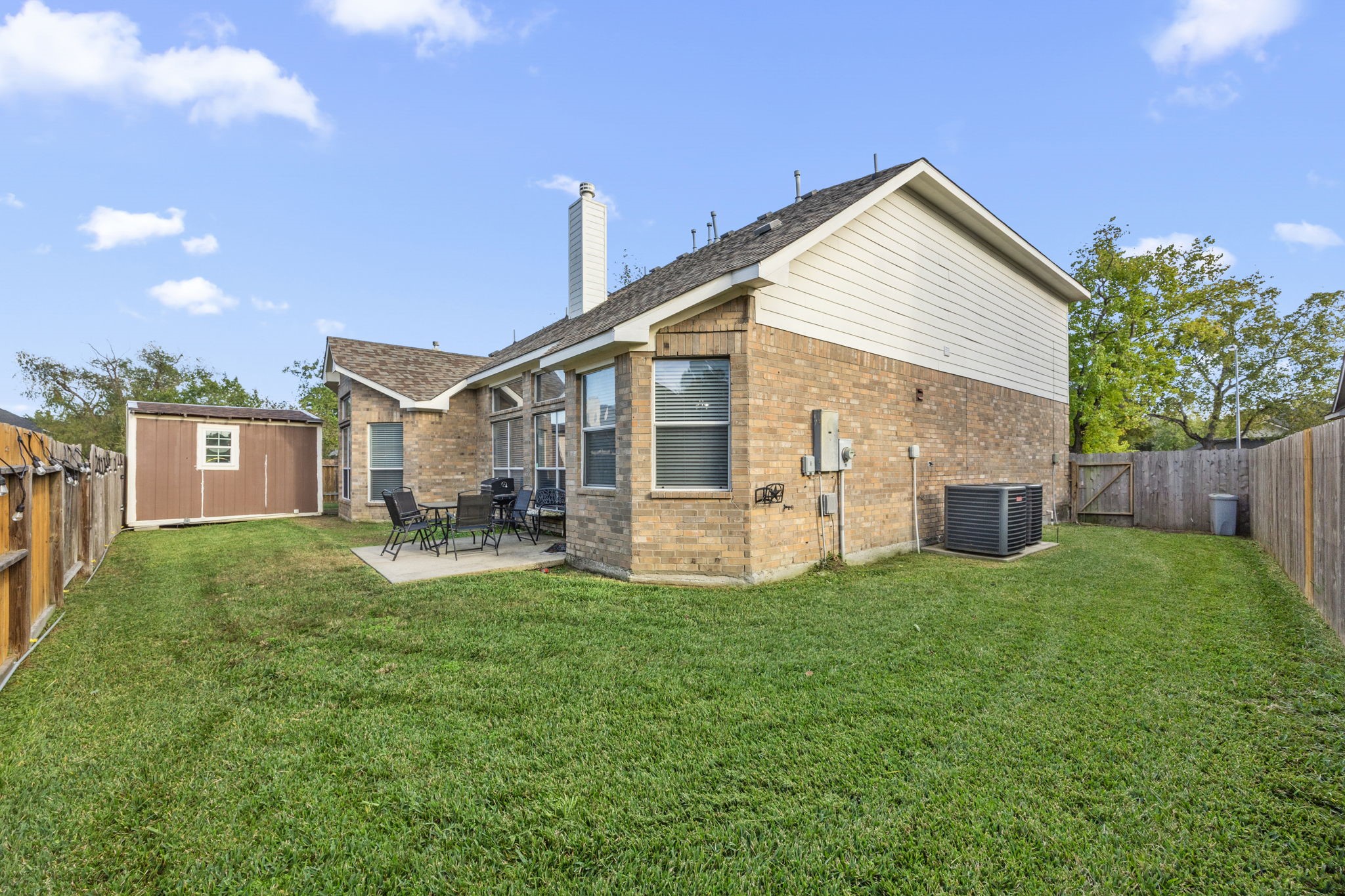 927 Spring Source Place Spring, TX 77373 - Photo 31 of 37 a view of a house with a yard and deck