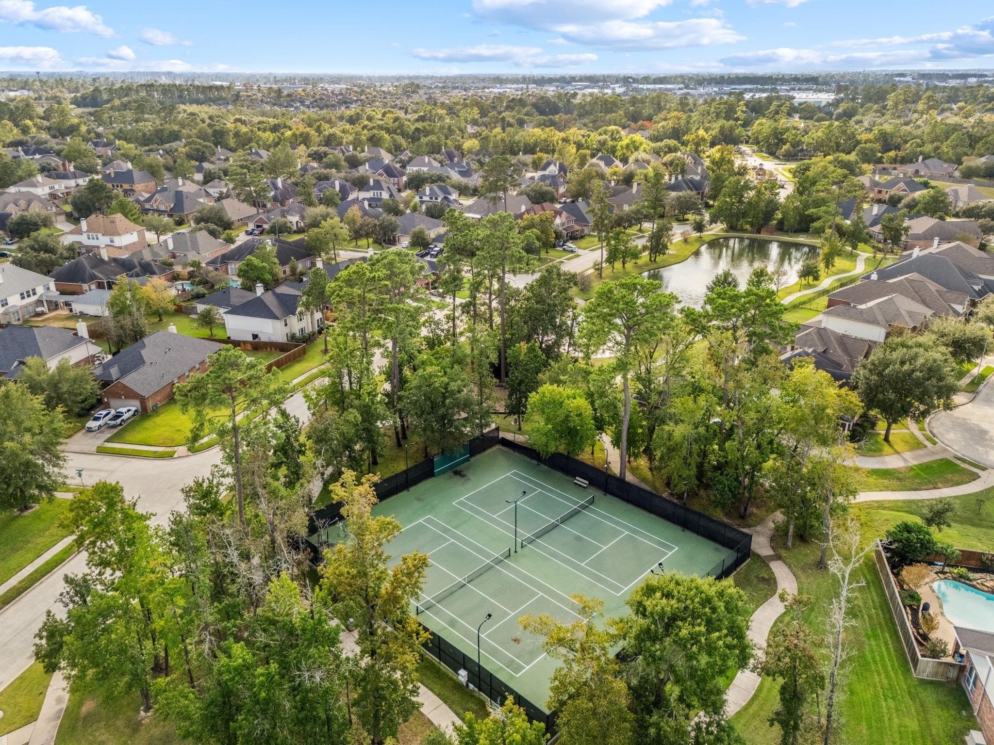 927 Spring Source Place Spring, TX 77373 - Photo 36 of 37 a view of a yard with an outdoor seating