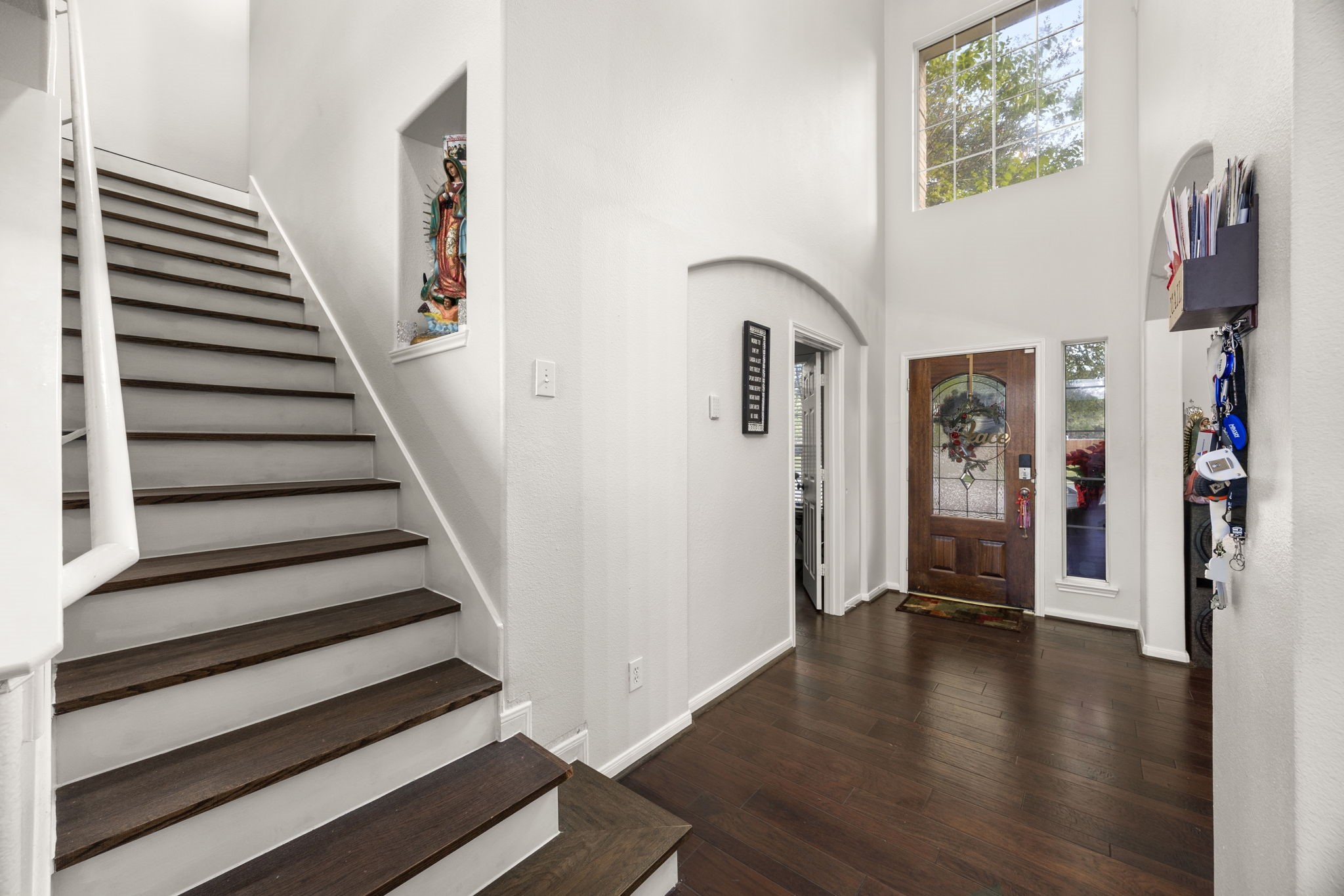 927 Spring Source Place Spring, TX 77373 - Photo 4 of 37 a view of entryway with wooden floor
