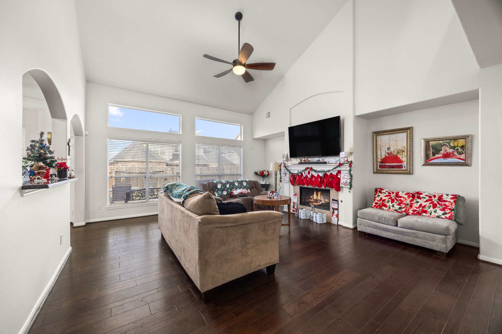 927 Spring Source Place Spring, TX 77373 - Photo 9 of 37 a living room with furniture and a flat screen tv