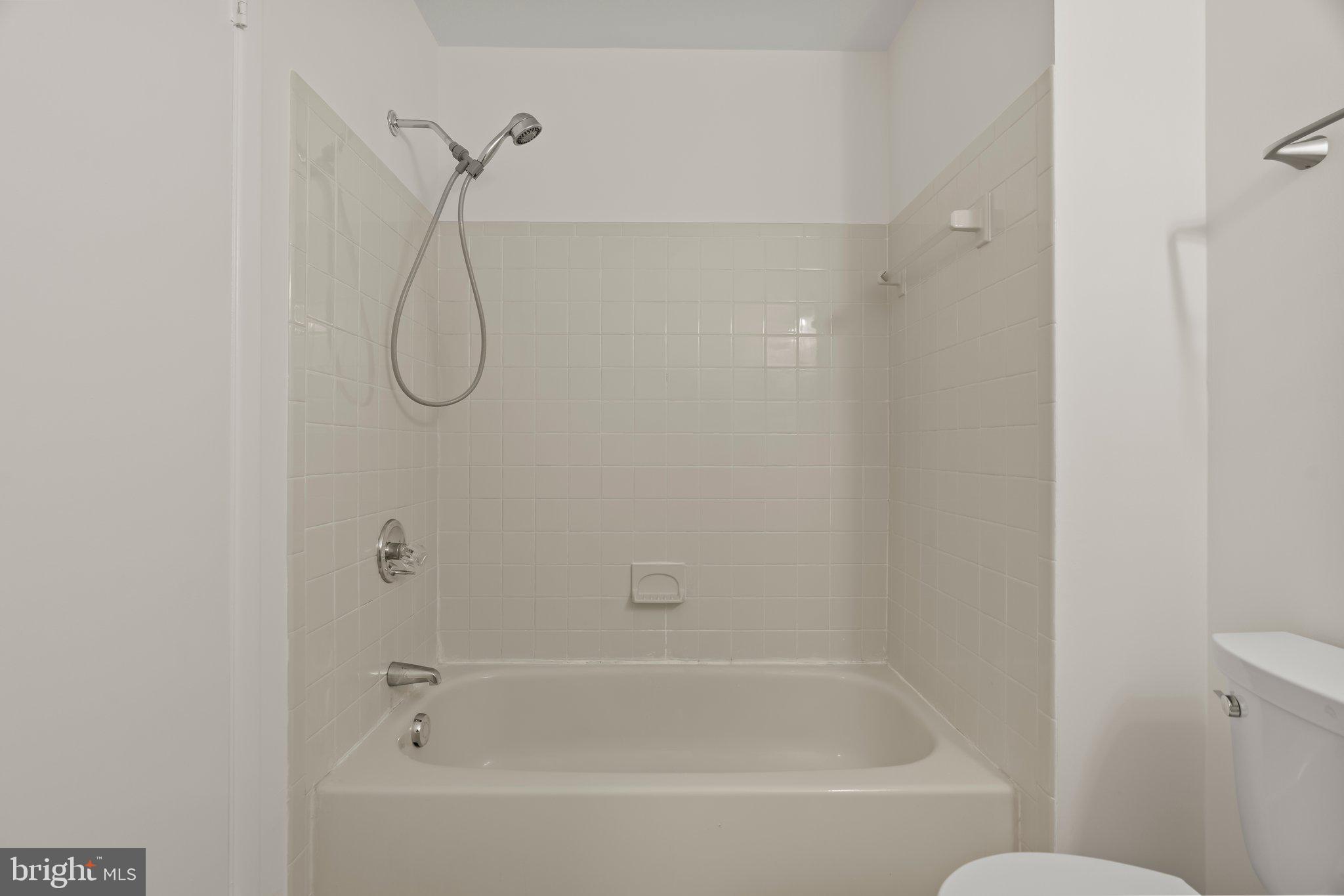 330 B Delancey Place Mount Laurel, NJ 08054 - Photo 20 of 21 a bathroom with a bath tub and a shower