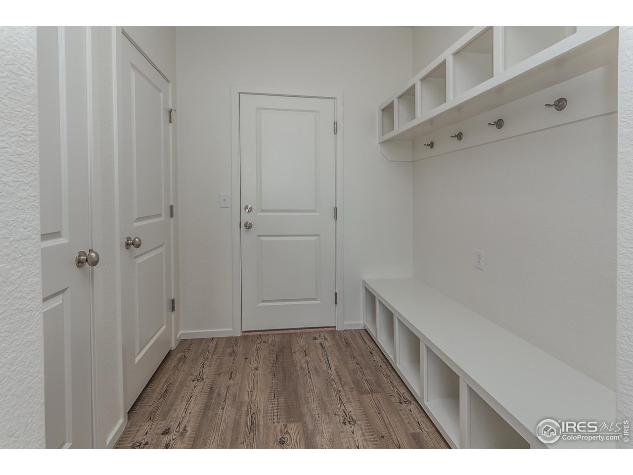 6642 4th St Road Greeley, CO 80634 - Photo 20 of 40 ENTRY FROM GARAGE W/ CUBBIES
