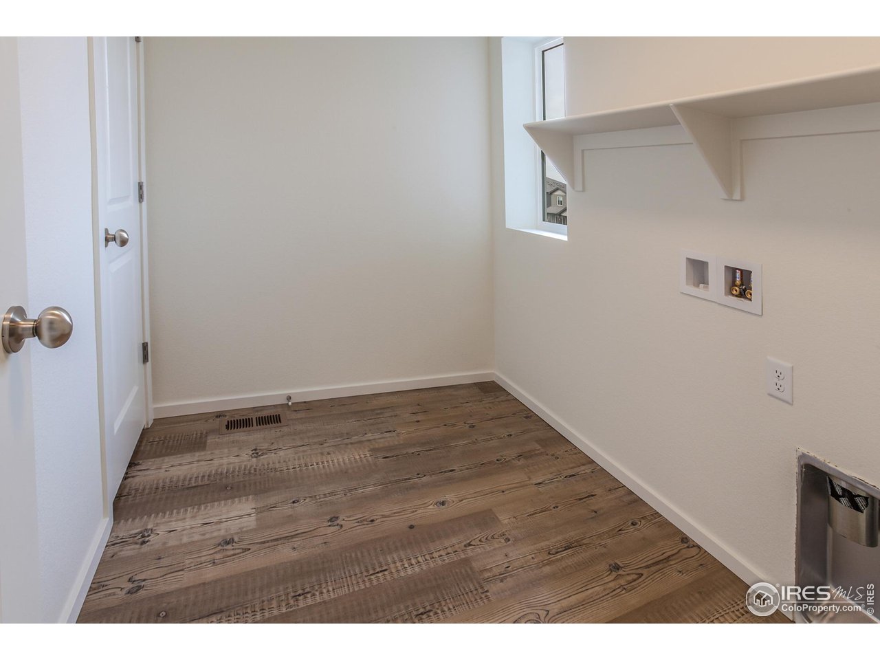 6642 4th St Road Greeley, CO 80634 - Photo 23 of 40 LAUNDRY ON SECOND LEVEL