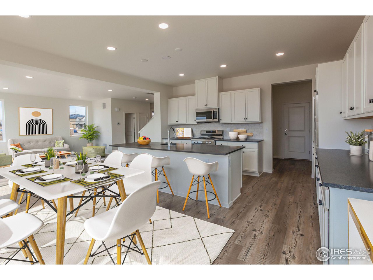 6642 4th St Road Greeley, CO 80634 - Photo 5 of 40 KITCHEN, DINING AND LIVING ROOM (VIRTUALLLY STAGED)
