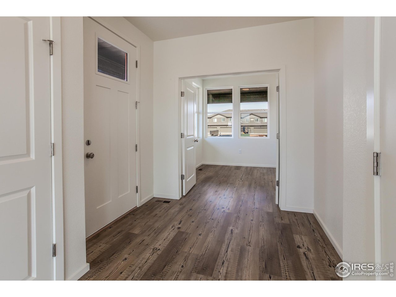6642 4th St Road Greeley, CO 80634 - Photo 6 of 40 FRONT ENTRY & STUDY
