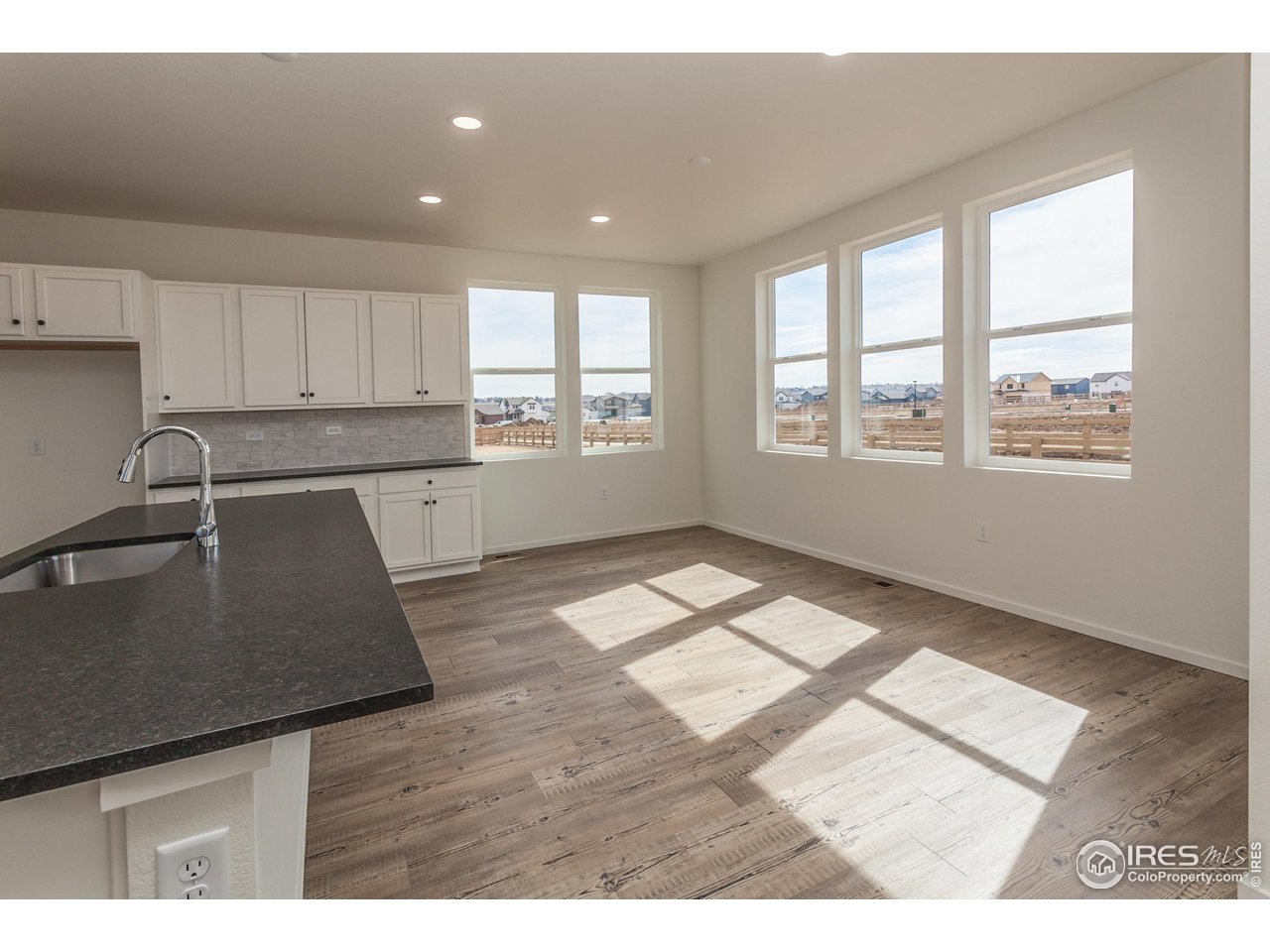 6642 4th St Road Greeley, CO 80634 - Photo 9 of 40 KITCHEN AND DINING