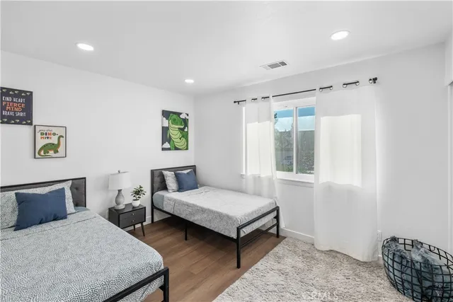 a en suite bathroom with a sink a mirror and a shower