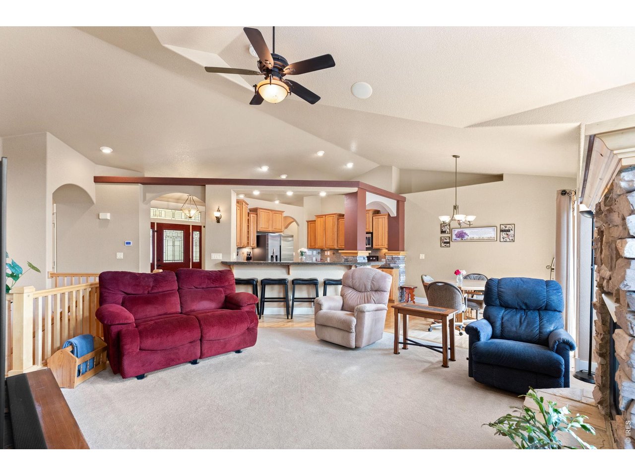 6710 31st St Road Greeley, CO 80634 - Photo 12 of 41 Welcoming great room feel with dining, family and kitchen