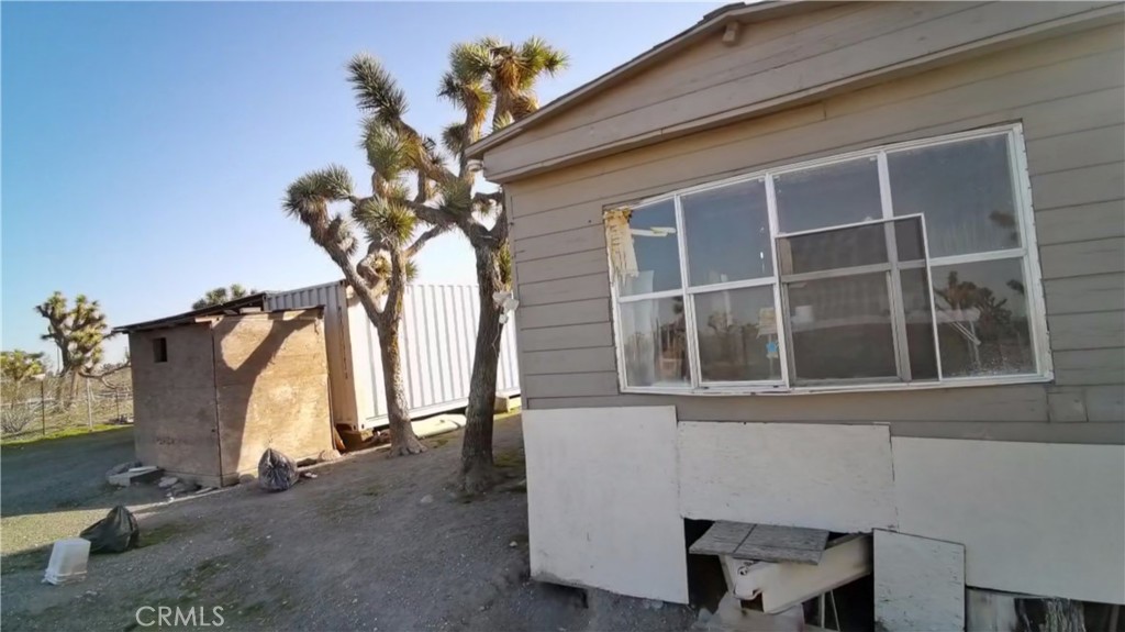 12543 Buckwheat Road Phelan, CA 92371 - Photo 33 of 37 a view of a house with a window