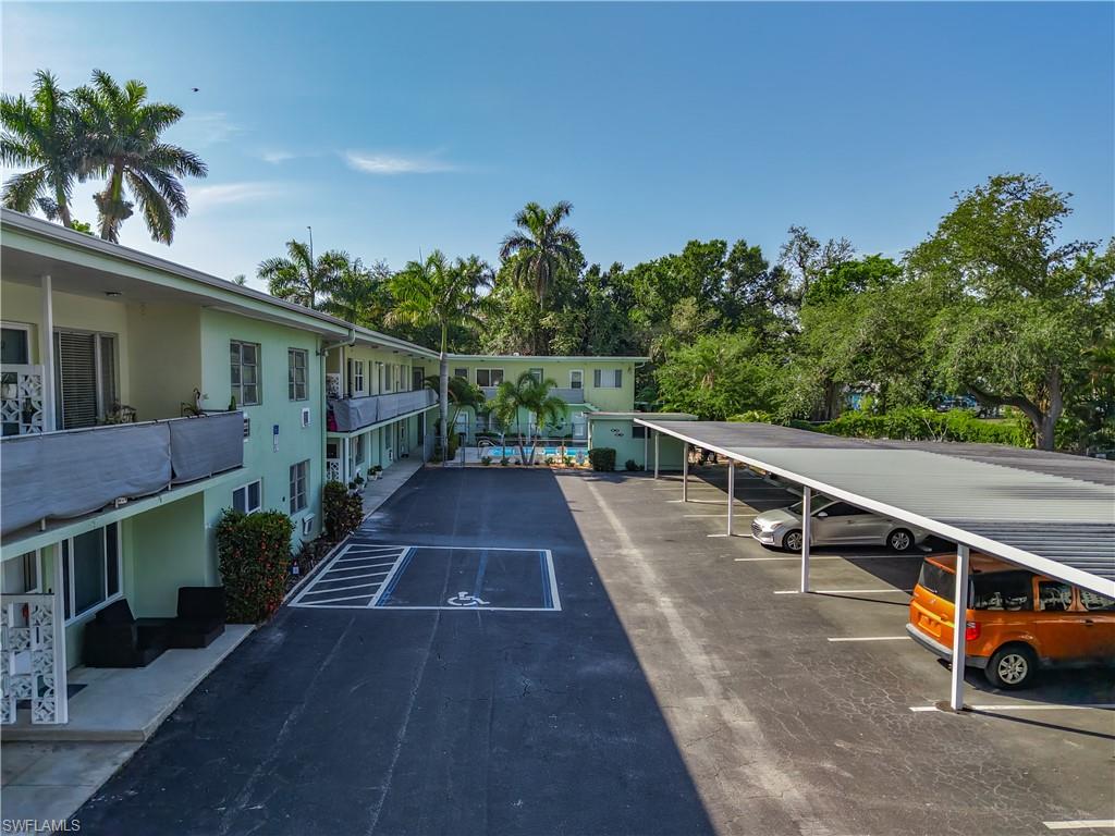a view of balcony with furniture