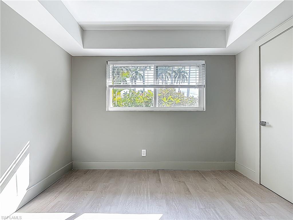 2544 First Street, Unit 102 Fort Myers, FL 33901 - Photo 23 of 26 an empty room with a window