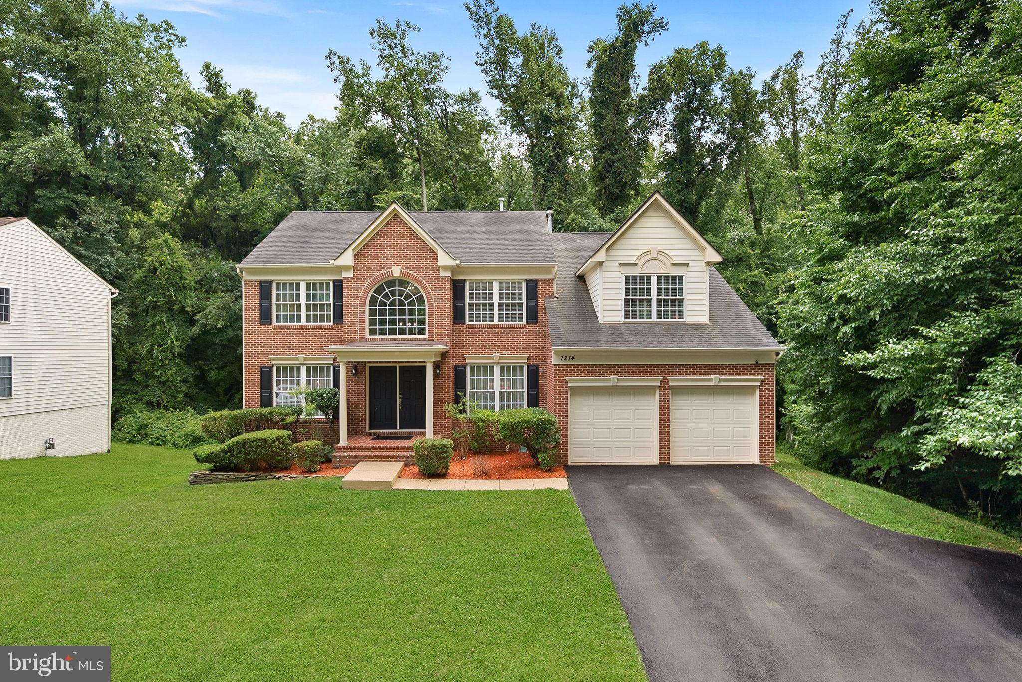 7214 Calamo Street Springfield, VA 22150 - Photo 2 of 77 Classic brick front elevation