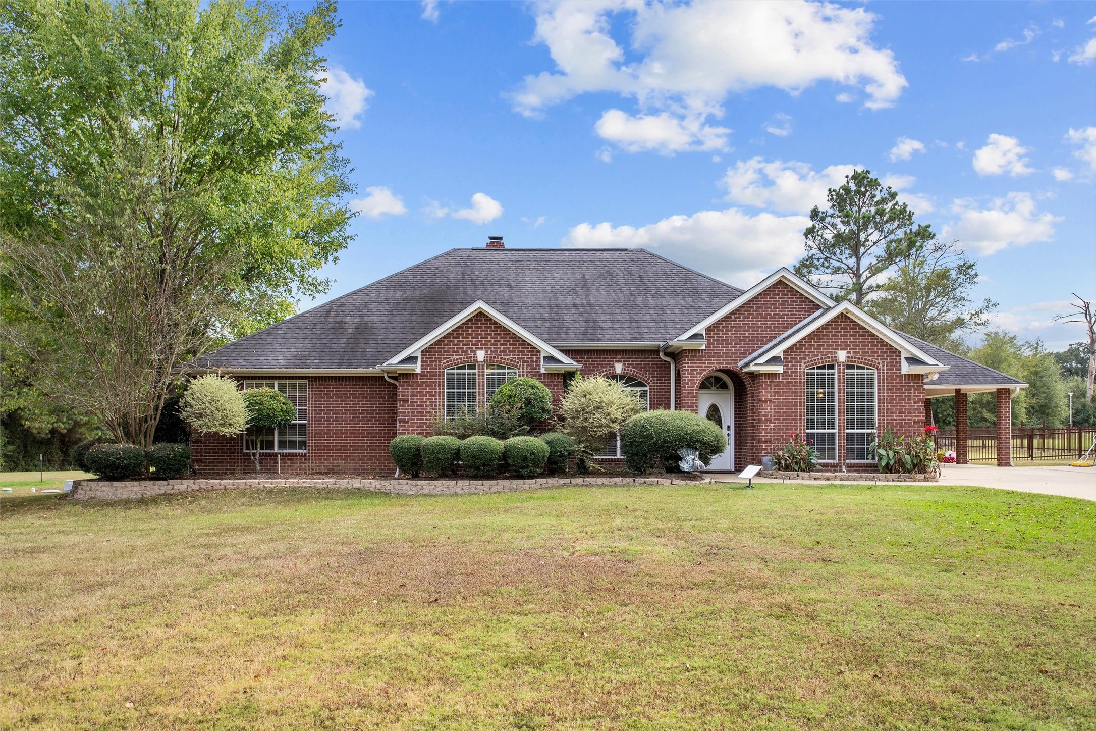 2101 San Antonio Road Crockett, TX 75835 - Photo 1 of 37 a front view of a house with a yard