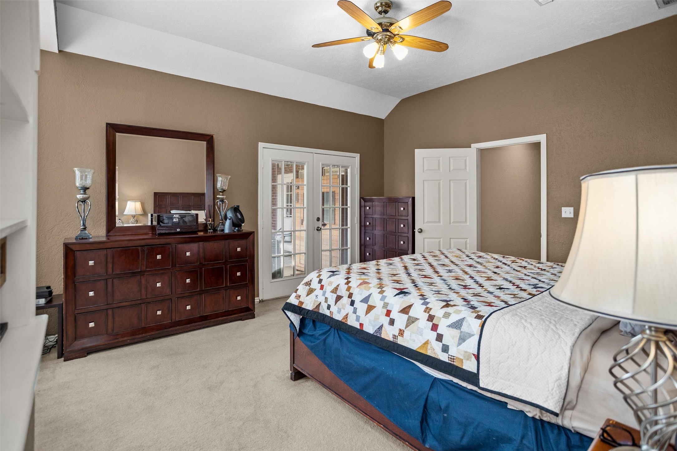 2101 San Antonio Road Crockett, TX 75835 - Photo 20 of 37 a bed room with a bed and a dresser