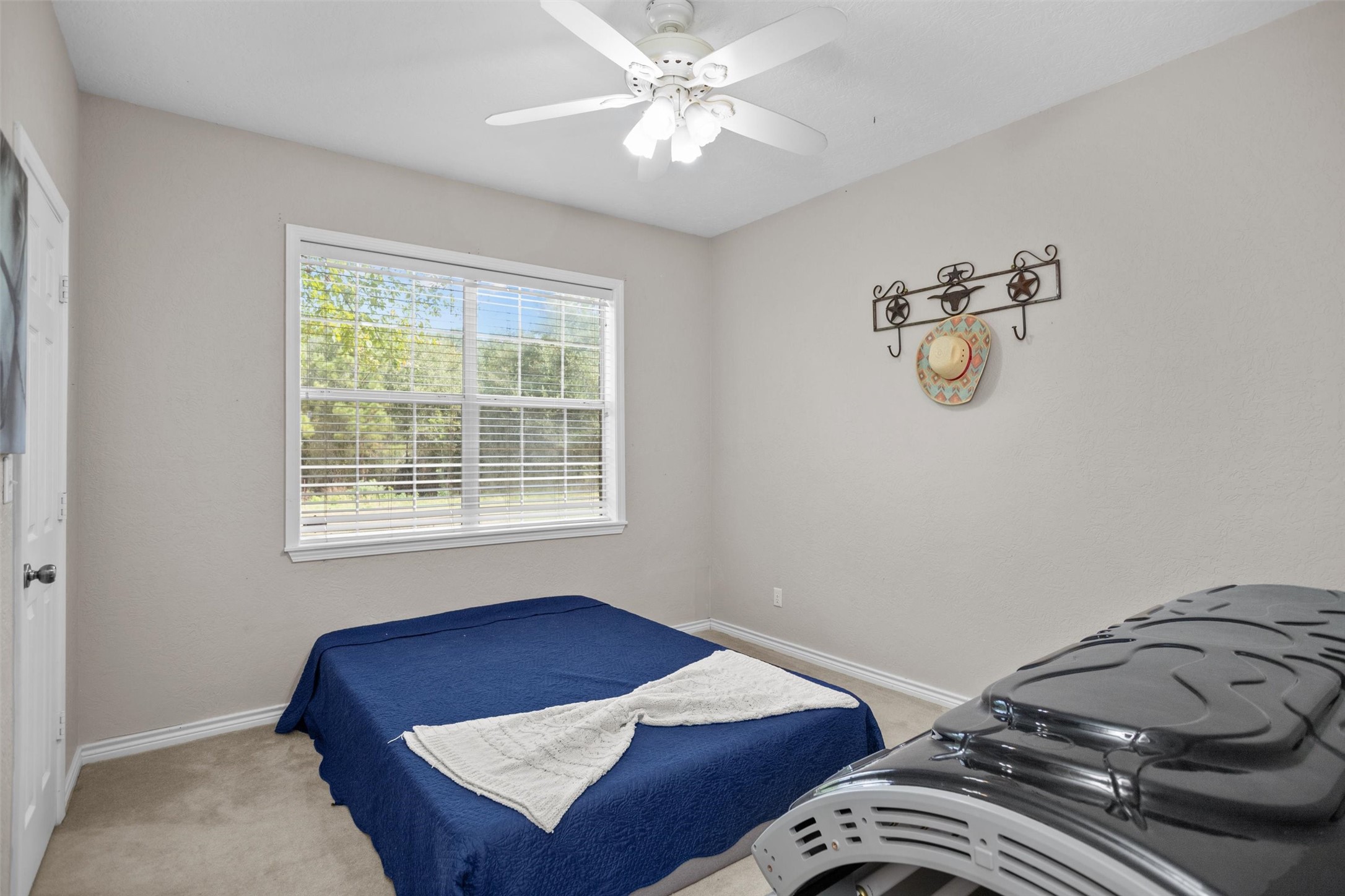 2101 San Antonio Road Crockett, TX 75835 - Photo 27 of 37 a bedroom with a bed and a window
